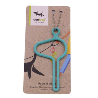 teal Dooloop Dog Waste Bag Holder on display card