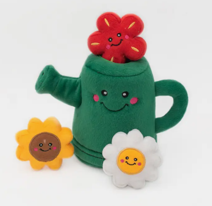 green watering can burrow toy for dogs with three flowers