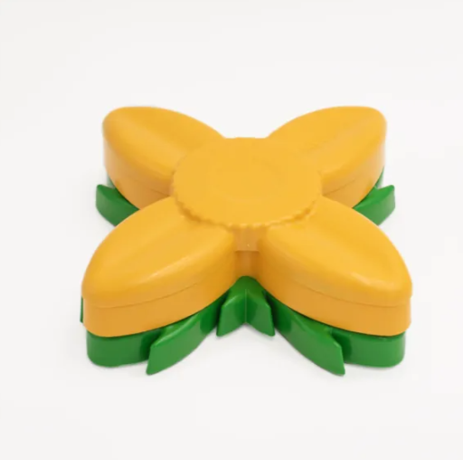 yellow and green sunflower dog puzzler food and treat dispenser closed