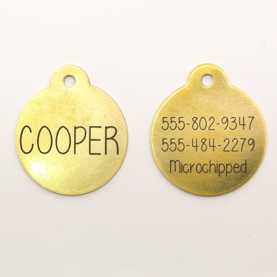 front and back of brass classic dog ID tags
