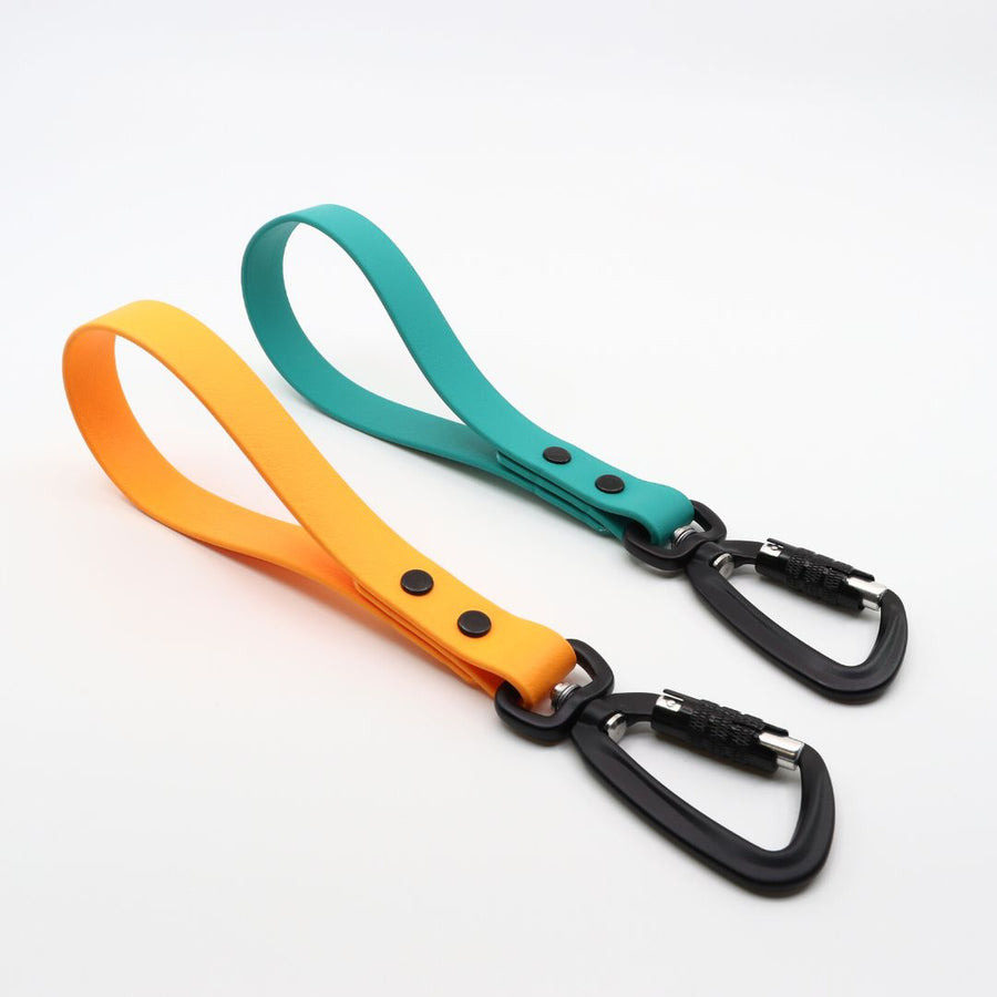 two biothane sport traffic handles in poppy and teal