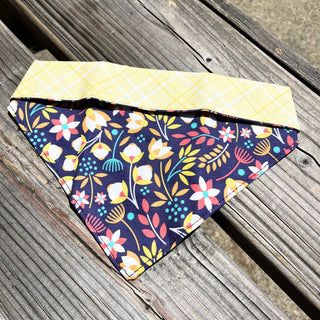 misty made this dog bandana petal power laying on a bench