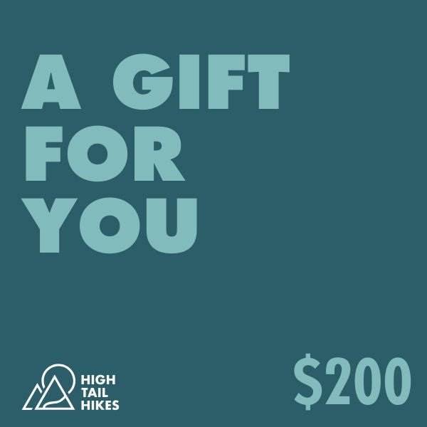 Promotional graphic for a gift card from High Tail Hikes with text 'A Gift For You' and amount '$200' on a teal background.