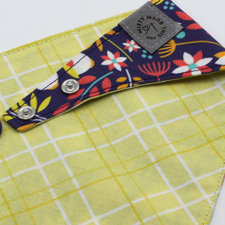 close up of snaps on the misty made this dog bandana petal power