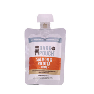 tan, blue, and orange bark pouch dog treat in salmon & ricotta recipe on a white background