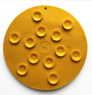 bottom of the yellow duckies design emat dog enrichment lick mat showing suction cups