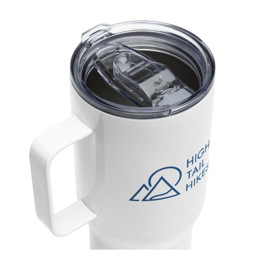 white travel mug showing top of lid and blue high tail hikes logo