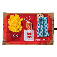 plush dog puzzle mat with french fries, hotdog and napkin on the front in red, yellow and blue
