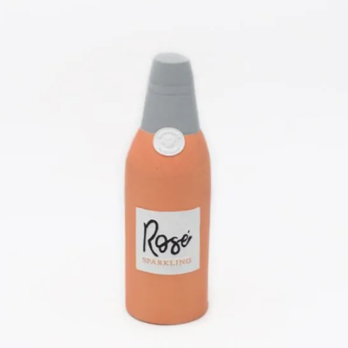 latex dog chew toy shaped like a bottle of rose