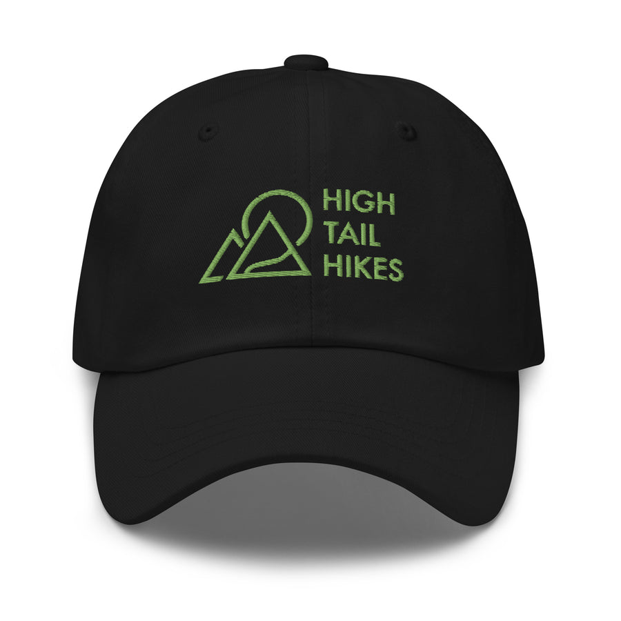 black dad hat with green high tail hikes logo