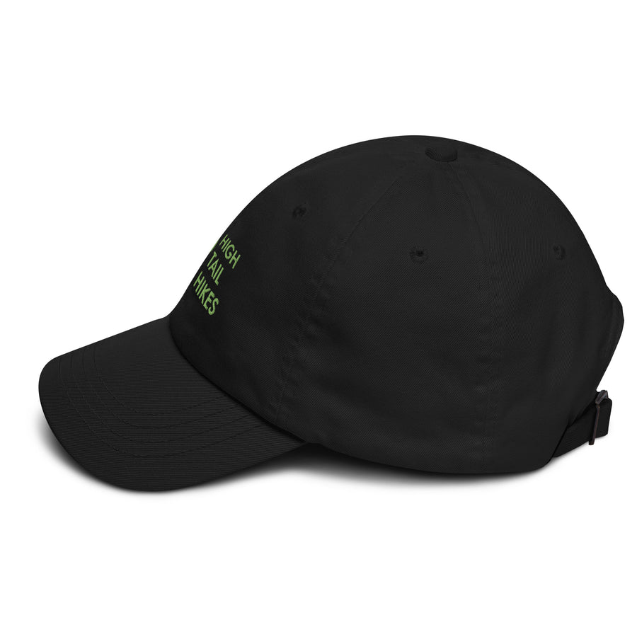 side view of black dad hat with green high tail hikes logo