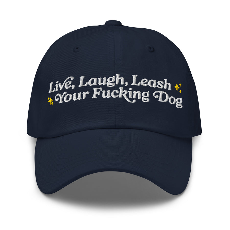 dark blue dad hat that reads "live, Laugh, Leash your f dog"
