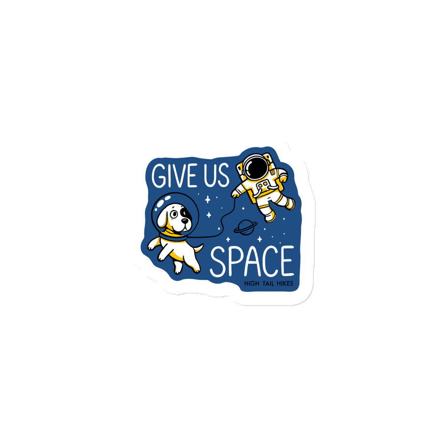 cut out magnet in blue, with dog and astronaut reading "Give Us Space"