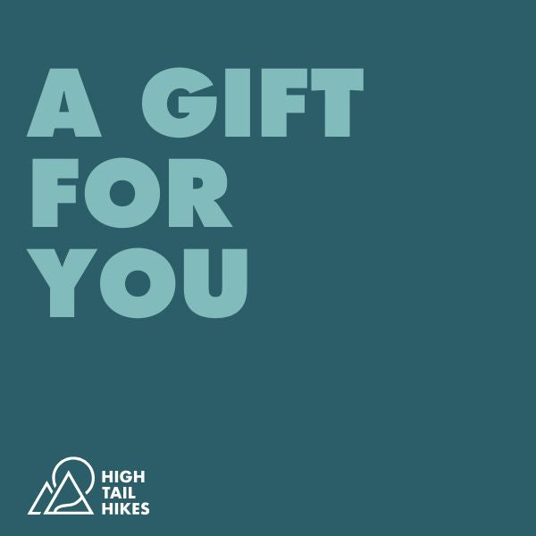 Promotional graphic with 'A Gift For You' text and High Tail Hikes logo on a teal background