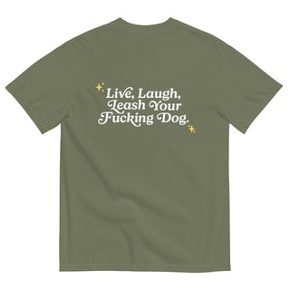 back of olive green unisex t-shirt that reads "Live, Laugh, Leash Your F Dog" in white letters and gold stars in the coroners