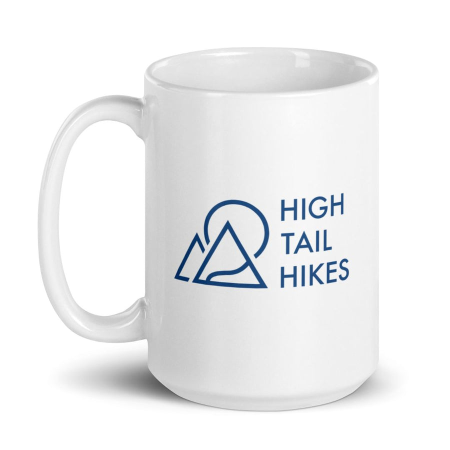 15 oz white ceramic mug with blue high tail hikes logo, handle to the left