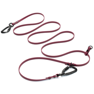 plum waterproof hands free dog leash with black carabiners on a white background