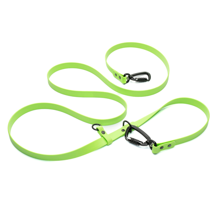 bright green waterproof biothane dog leash with black carabiner on a white background