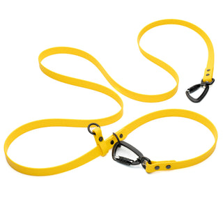 yellow waterproof dog leash showing black carabiner hands free hardware on white background