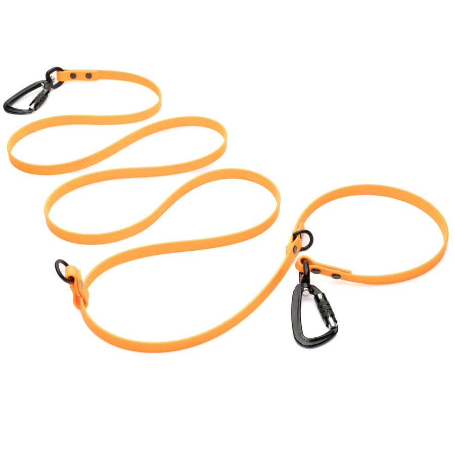 orange hands free waterproof dog leash with black carabiner hardware on white background