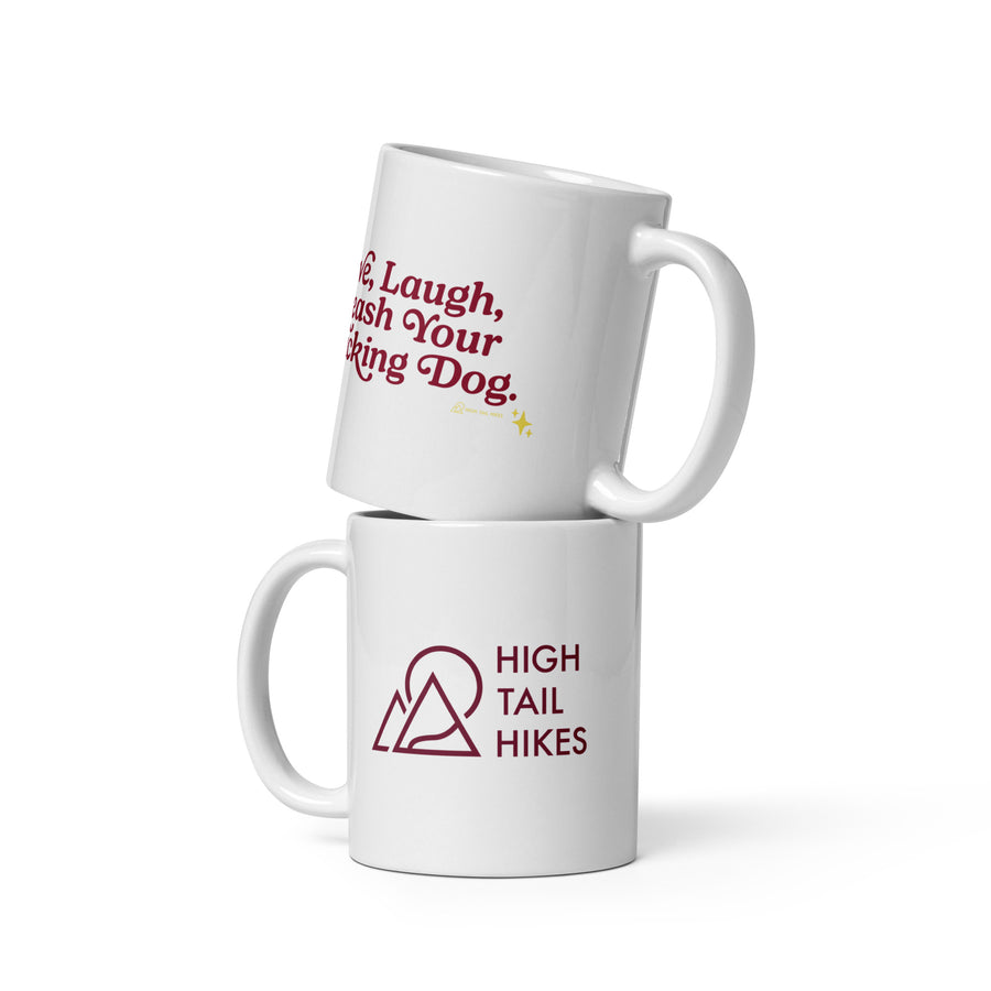 two white 11 oz ceramic mugs stacked on top of each other - the top has red letters that read "Live, Laugh, Leash Your F Dog" while to bottom mug has a red "high Tail hikes" logo