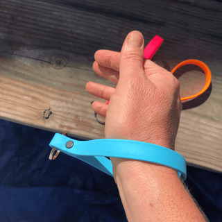 persons write wearing a BioThane Key fob to show how they fit