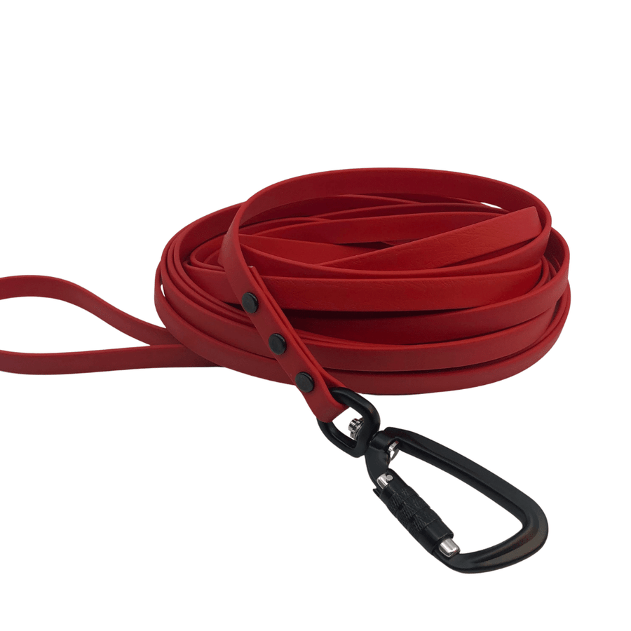 red long line biothane dog leash with sport hardware on white background