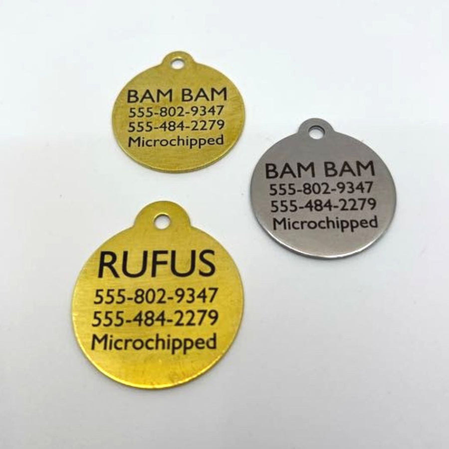 two brass and one silver classic dog ID tags