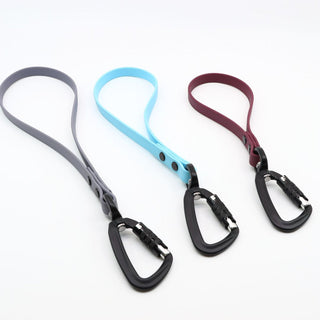 three biothane sport traffic handles in granite, sky blue, and plum