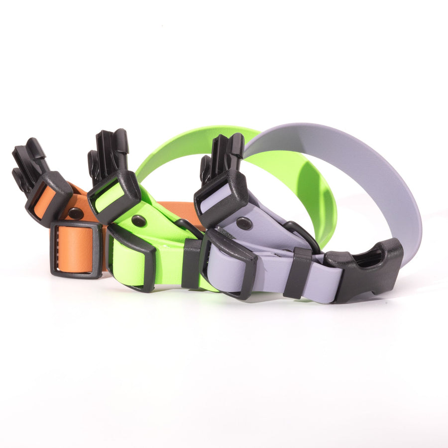 poppy, green and graphite biothane dog collars with sport hardware on white background