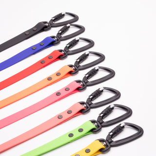 black sport hardware carabeaner clip on biothane dog leash with white background