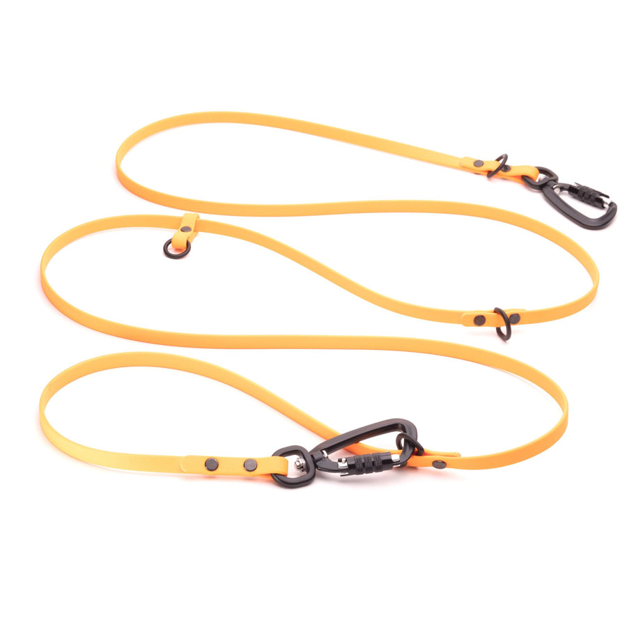 yellow hands free biothane dog leash with sport hardware on white background