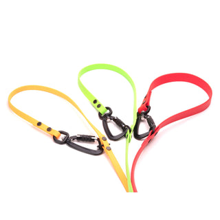 orange green and red biothane dog leash with sport hardware on white background